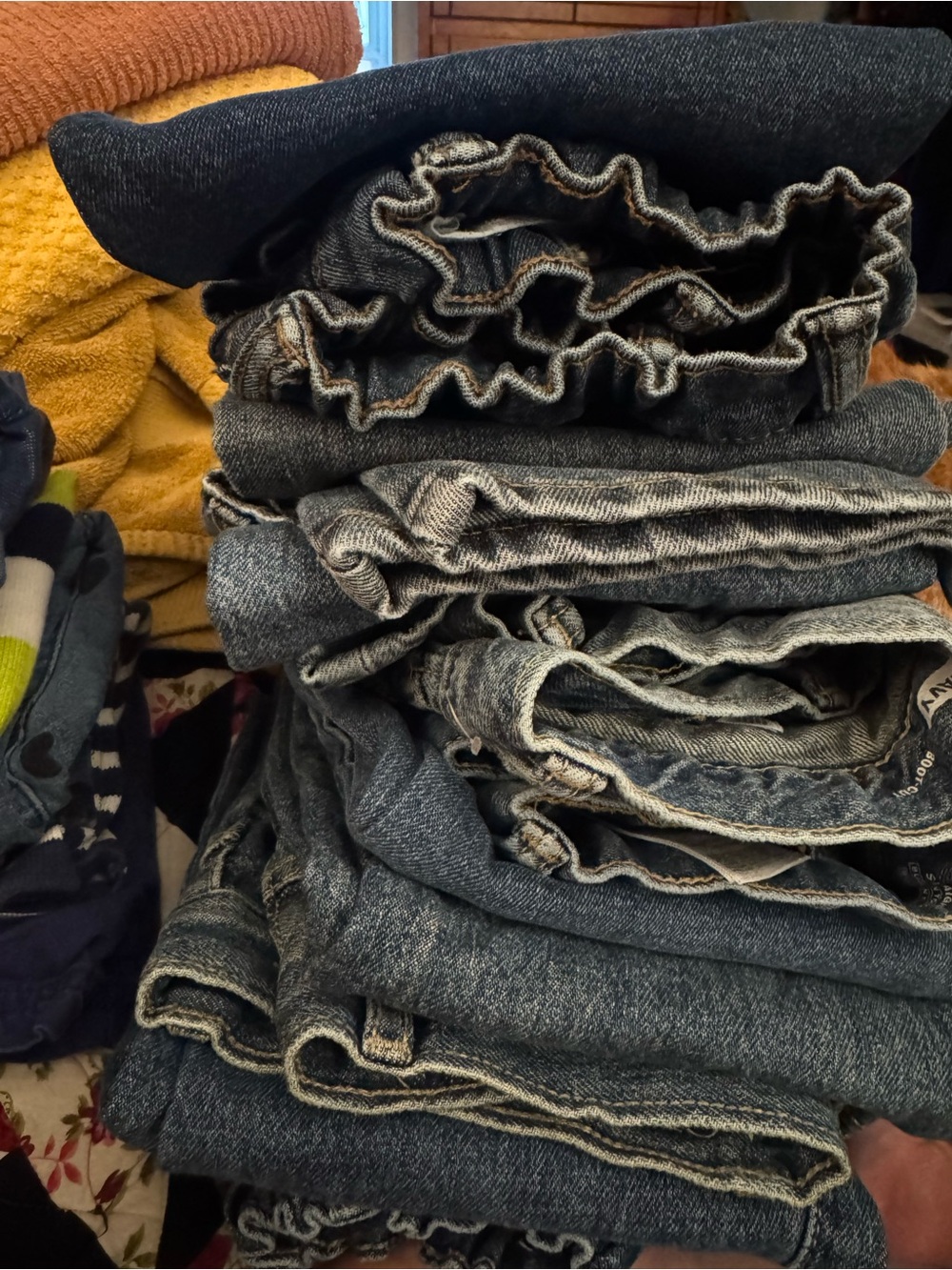Six pairs of boys jeans